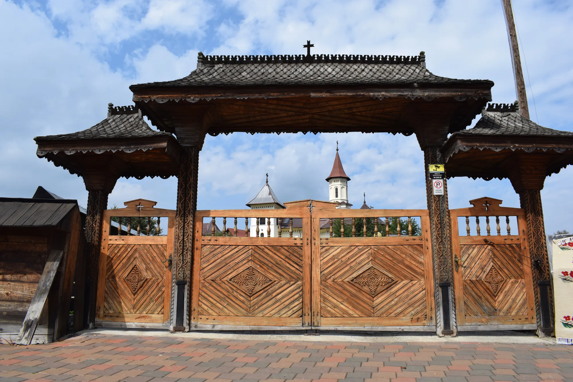 A carved wooden gate at a Bucovina monastery